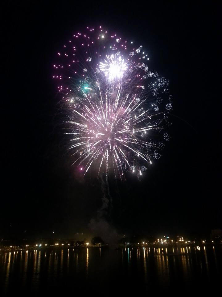 fireworks over lake mirror